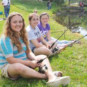 Not everyone catches a fish at the annual kids’ fishing tournament, but everyone has a good time. (photo by Robert Ford)