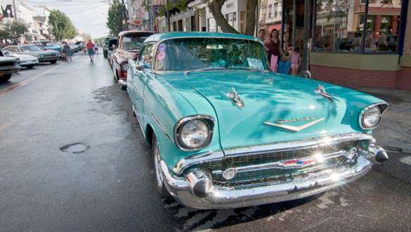 A teal ‘57 Chevy sits proudly on Main Street, Saugerties, at last year’s show. (photo by Robert Ford)