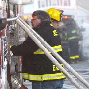 Firefighter of the year: Brian Martin almost always has the lead fire truck at the fire scene before anyone else, as he did at the fire on Overbaugh Street last year. (photo by Robert Ford)