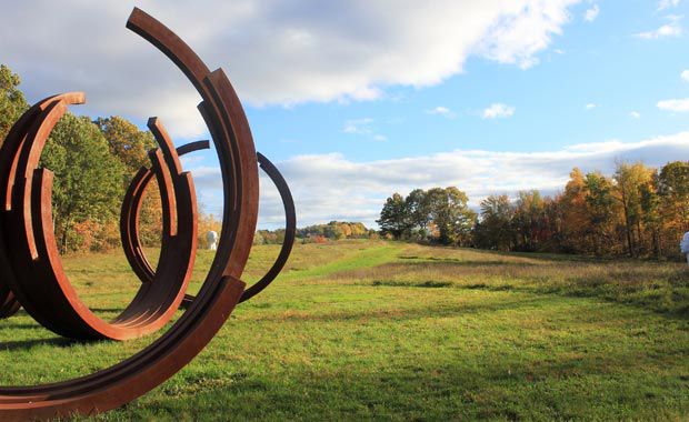 Arcs of Disorder by Bernar Venet at Omi International Arts Center in Ghent. Omi's 300 acres, open to the public, include a Visitors’ Center with a gallery, and the Fields Sculpture Park with more than 80 pieces of contemporary sculpture always on display. (Omi International Arts Center)