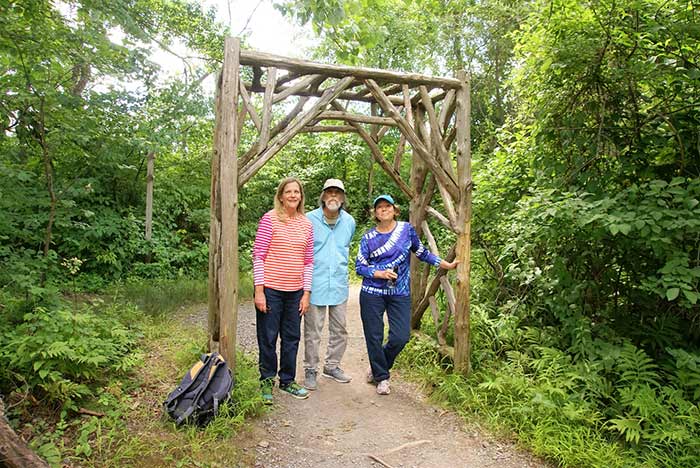 Diane, Spider and Debbie Barbour at the trail’s archway. (photos by Anita Barbour)