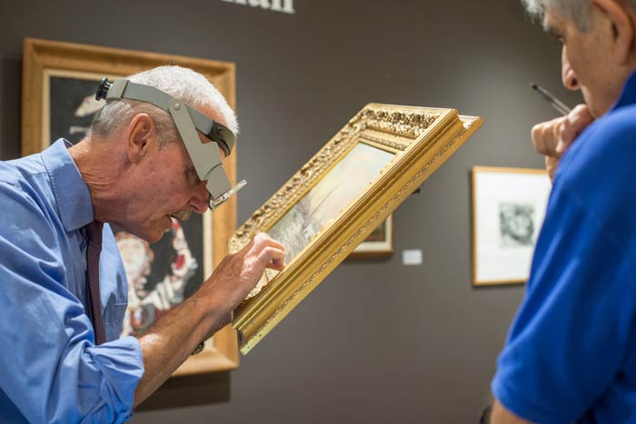 William Jenack gets a closer look. (photo by Dion Ogust)