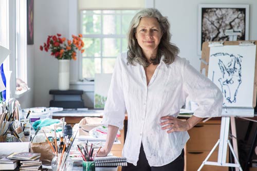 Artist Dion Ogust in her Woodstock studio