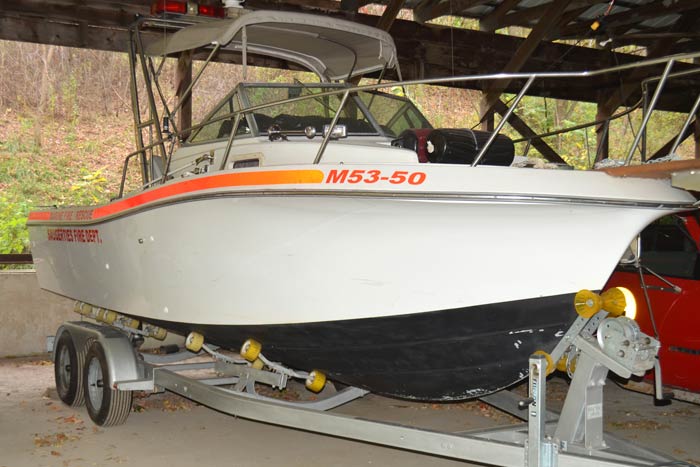 The Fire Department’s boat awaiting a water pump. (photo by Robert Ford)