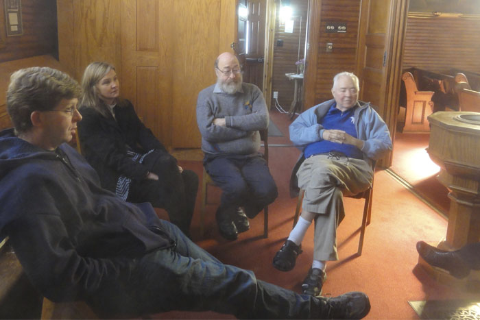 Josh Bode, Sonja Tillberg MacLary, Jan Tarlin, and Father George (photo by Violet Snow)