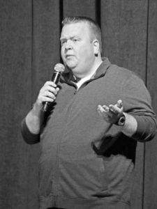 Saugerties High School graduate and local comedian Mike Speirs performs.
