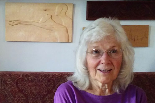 Georgette Kadgen with one of her artworks.
